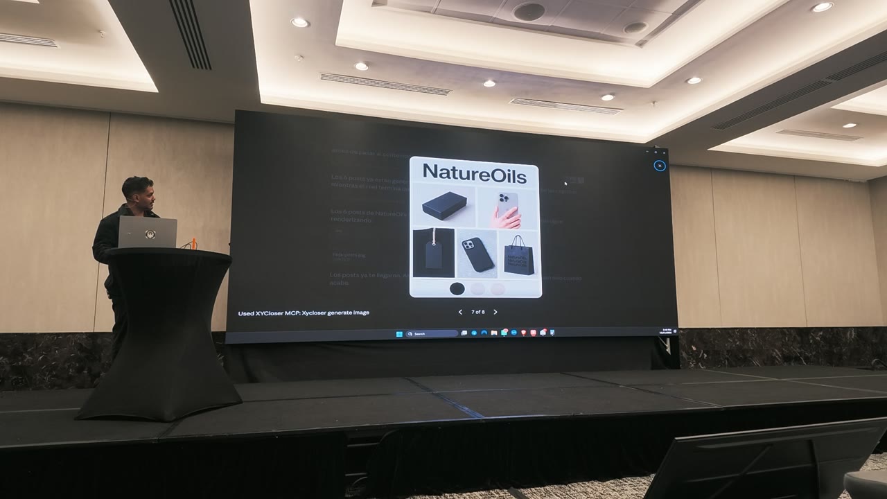 Chiragx on stage while the NatureOils Instagram posts are generated live with xyCloser on the screen